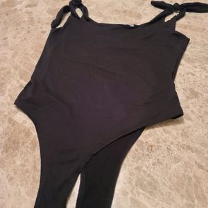 Small black bodysuit with tie shoulder straps